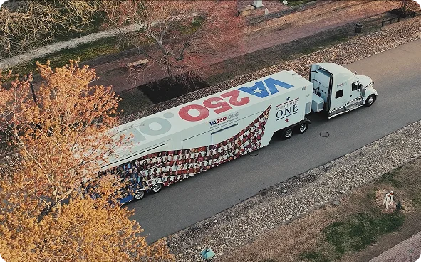 Aerial view of a truck with a trailer featuring a 
